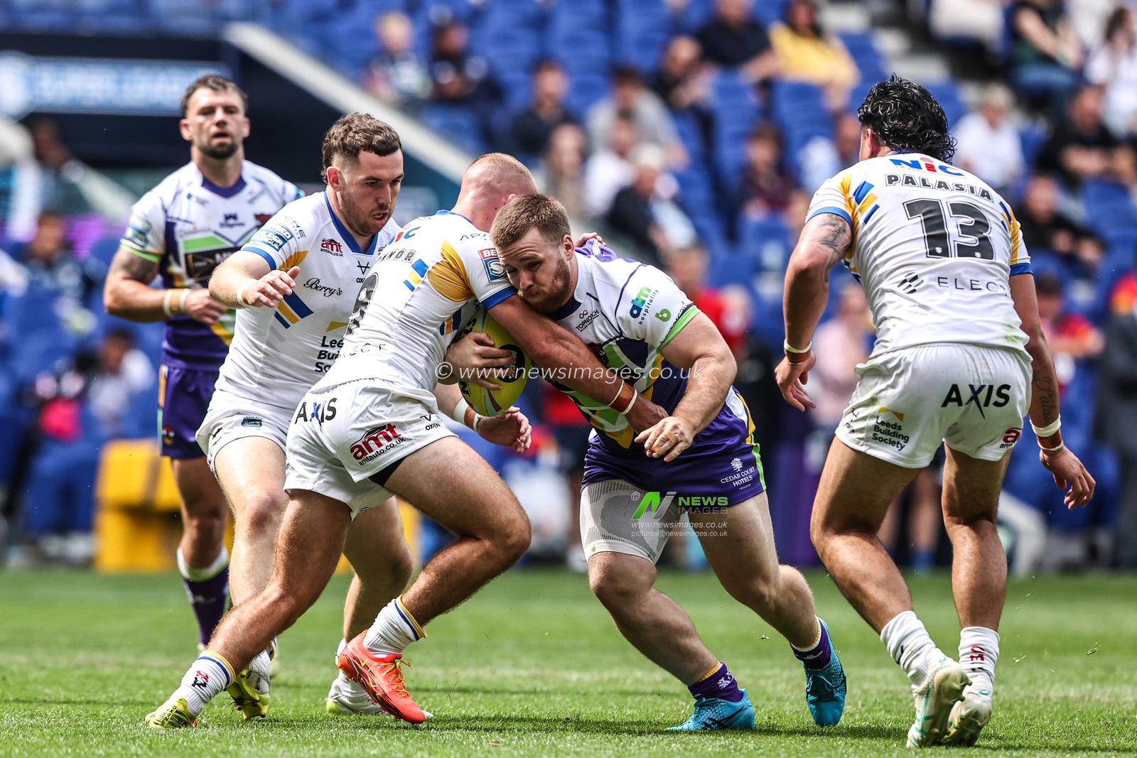 Ebon Scurr of Bradford Bulls is tackled by Jarrod O'Connor of Leeds Rhinos during the Betfred Super League Magic Weekend match Leeds Rhinos vs Bradford Bulls at Hill Dickinson Stadium, Liverpool, United Kingdom on 05 July 2026

(Photo by Alfie Cosgrove/News Images)