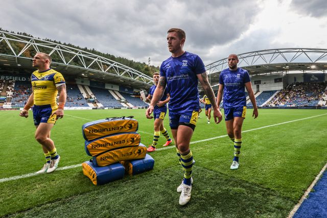 Marc Sneyd of Warrington Wolves leaves the field after warmups during the Betfred Super League Round 23 match Huddersfield Giants vs Warrington Wolves at Accu Stadium, Huddersfield, United Kingdom, 24th August 2025

(Photo by Alfie Cosgrove/News Images)