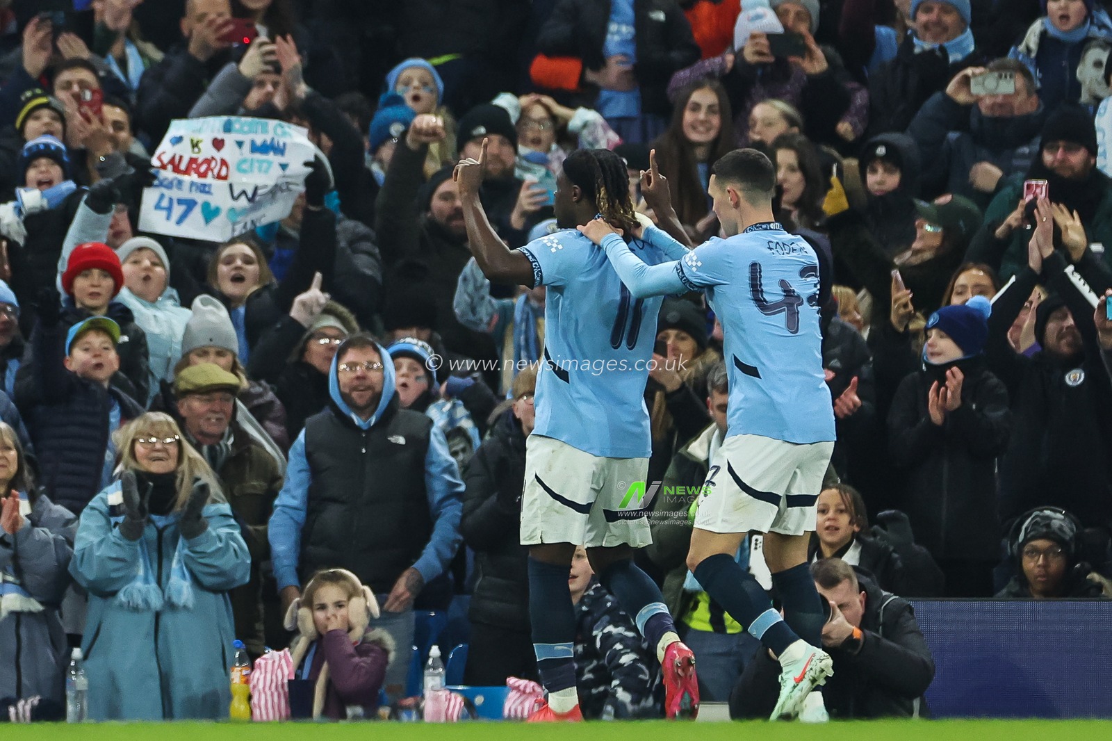 JÃ©rÃ©my Doku of Manchester City celebrates his goal to make it 6-0 during the Emirates FA Cup 3rd Round match Manchester City vs Salford City at Etihad Stadium, Manchester, United Kingdom, 11th January 2025

(Photo by Mark Cosgrove/News Images)
