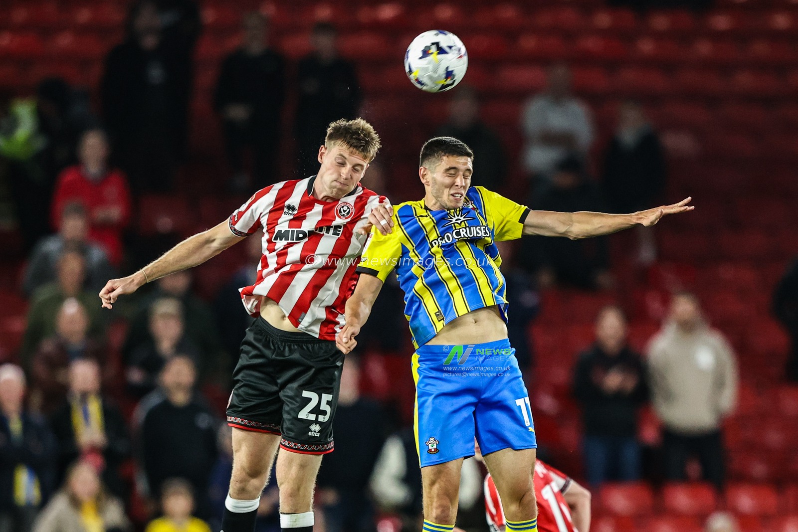 Mark McGuinness of Sheffield United jumps up to win the high ball Ross Stewart of Southampton during the Sky Bet Championship match Sheffield United vs Southampton at Bramall Lane, Sheffield, United Kingdom, 30th September 2025

(Photo by Alfie Cosgrove/News Images)