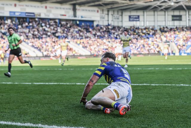 Matty Ashton of Warrington Wolves goes over for a try during the Betfred Super League round 5 match Warrington Wolves vs Castleford Tigers at The Halliwell Jones Stadium, Warrington, United Kingdom on 21 March 2026

(Photo by Alfie Cosgrove/News Images)