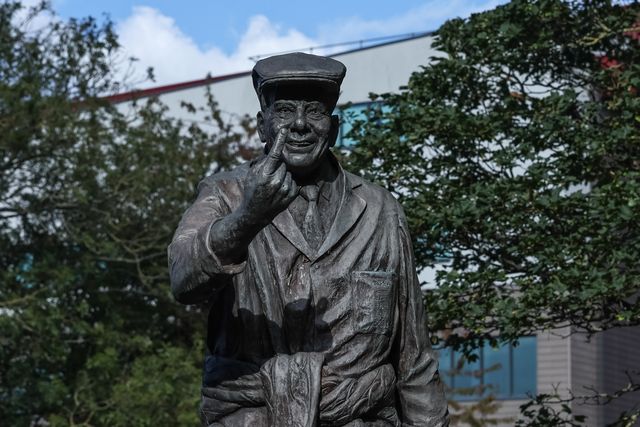 Flowers are laid at The Harold 'Dickie' Bird MBE, OBE statue after his passing today at the age of 92, Barnsley, United Kingdom, 23rd September 2025

(Photo by Mark Cosgrove/News Images)