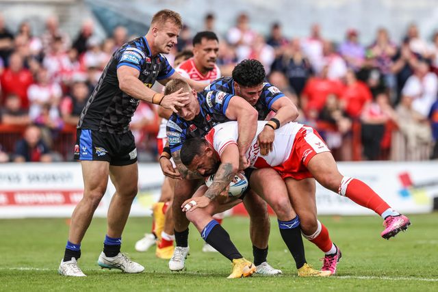 Elliot Minchella of Hull KR is tackled during the Betfred Super League round 17 match Hull KR vs Leeds Rhinos at Sewell Group Craven Park, Kingston upon Hull, United Kingdom, 6th July 2025

(Photo by Alfie Cosgrove/News Images)