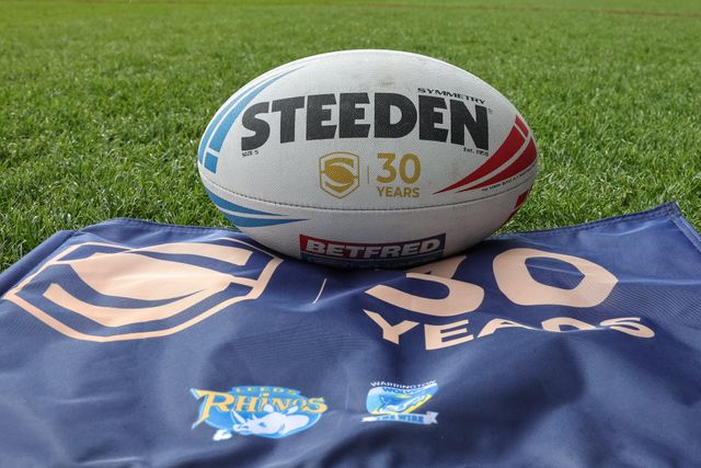 Super League 30 year celebration flag and Steeden match ball during the Betfred Super League round 6 match Leeds Rhinos vs Warrington Wolves at AMT Headingley Stadium, Leeds, United Kingdom on 29 March 2026

(Photo by Mark Cosgrove/News Images)