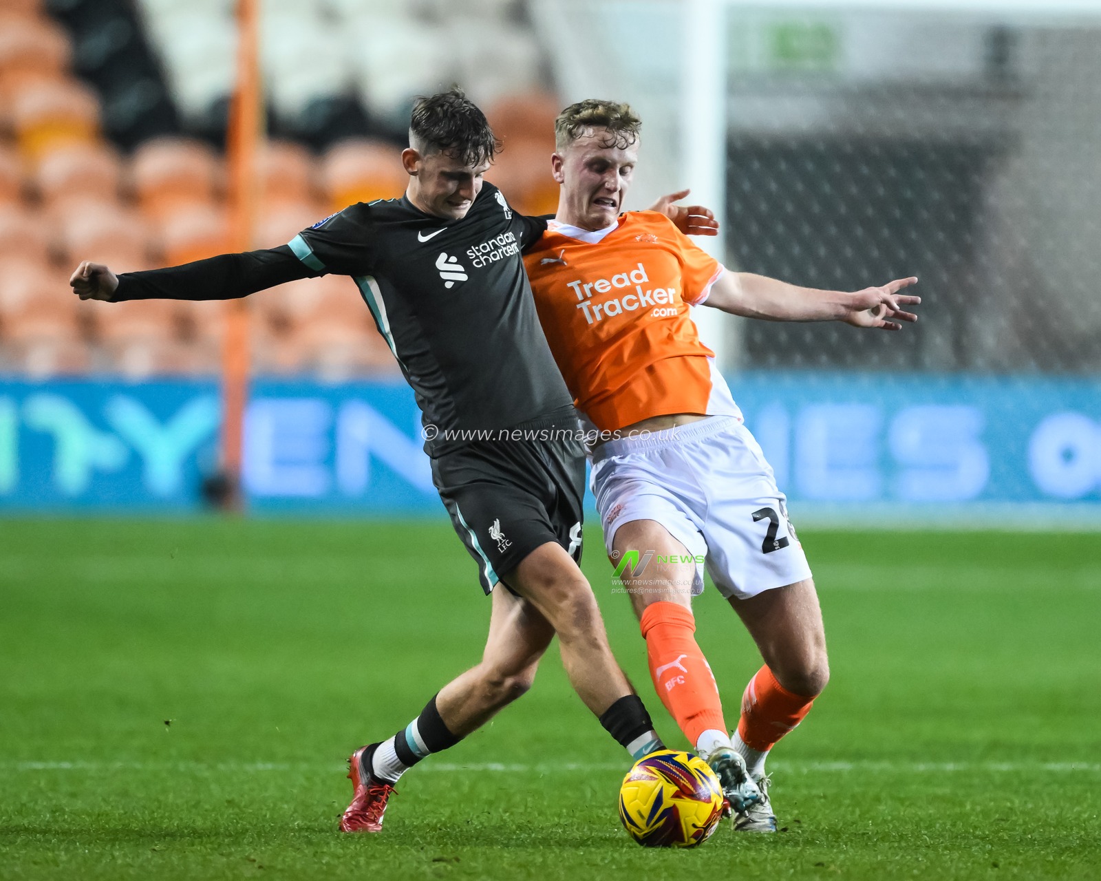 Ryan Finnigan of Blackpool and Tyler Morton of Liverpool battle for the ball during the Bristol Street Motors Trophy match Blackpool vs Liverpool U21 at Bloomfield Road, Blackpool, United Kingdom, 6th November 2024

(Photo by Craig Thomas/News Images)