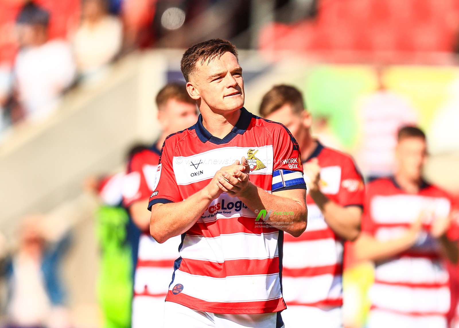 Owen Bailey of Doncaster Rovers applauds the fans during the Sky Bet League 1 match Doncaster Rovers vs Exeter City at Eco-Power Stadium, Doncaster, United Kingdom, 2nd August 2025

(Photo by Richard Bierton/News Images)