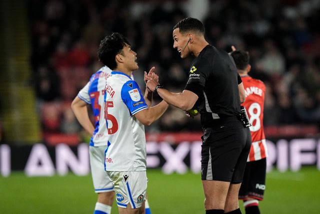 Referee Farai Hallam gives a yellow card to  Ryoya Morishita of Blackburn Rovers for dissent during the Sky Bet Championship match Sheffield United vs Blackburn Rovers at Bramall Lane, Sheffield, United Kingdom on 22 April 2026

(Photo by Maynard Manyowa/News Images)
