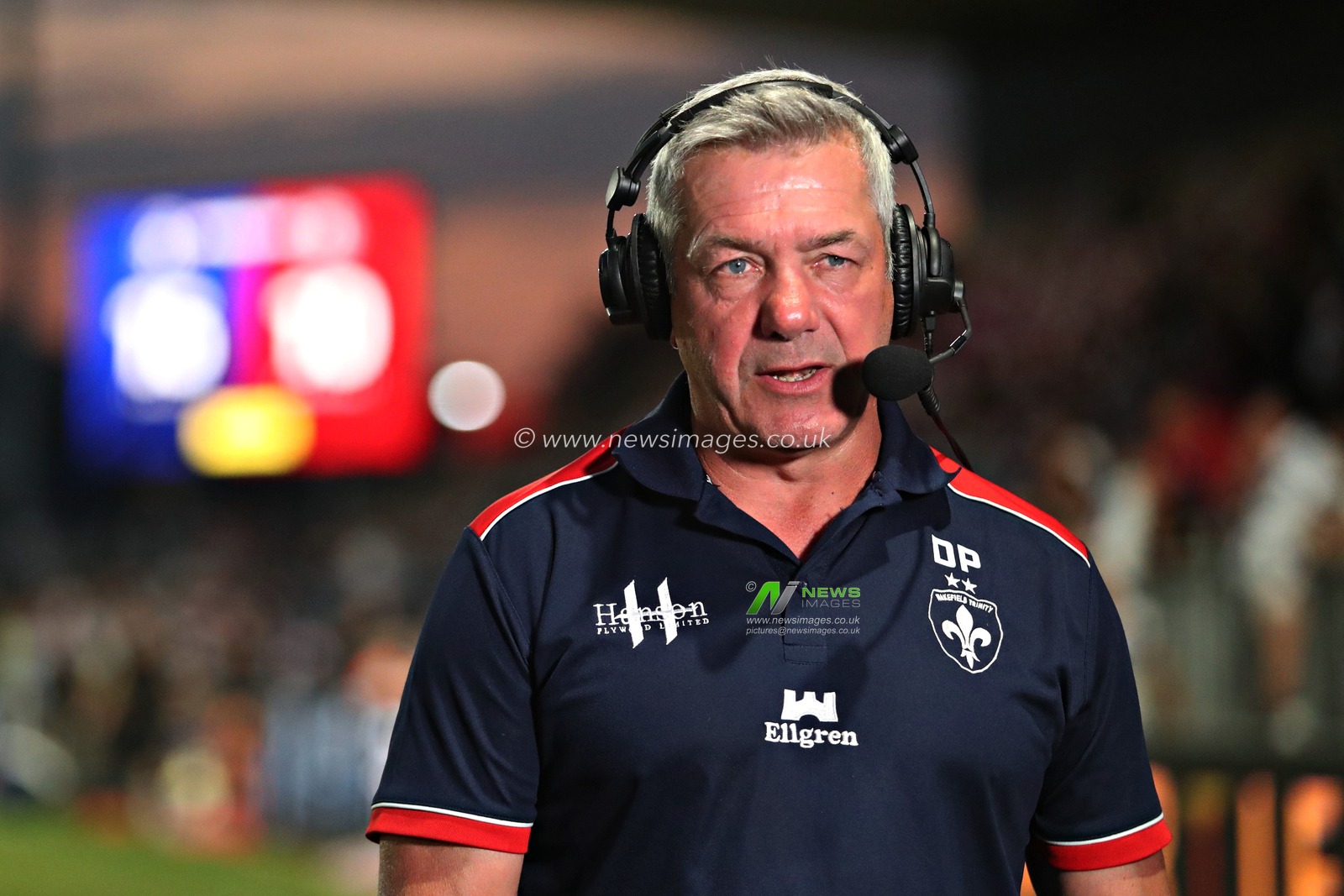Daryl Powell, Head Coach of Wakefield Trinity is interviewed in front of the scoreboard after the Betfred Super League round 15 match Wakefield Trinity vs Wigan Warriors at DIY Kitchens Stadium, Wakefield, United Kingdom, 20th June 2025(Photo by Sam Eaden/News Images)