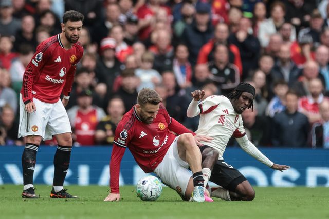 Jeremie Frimpong of Liverpool is tackled by Luke Shaw of Manchester United during the Premier League match Manchester United vs Liverpool at Old Trafford, Manchester, United Kingdom on 03 May 2026

(Photo by Mark Cosgrove/News Images)