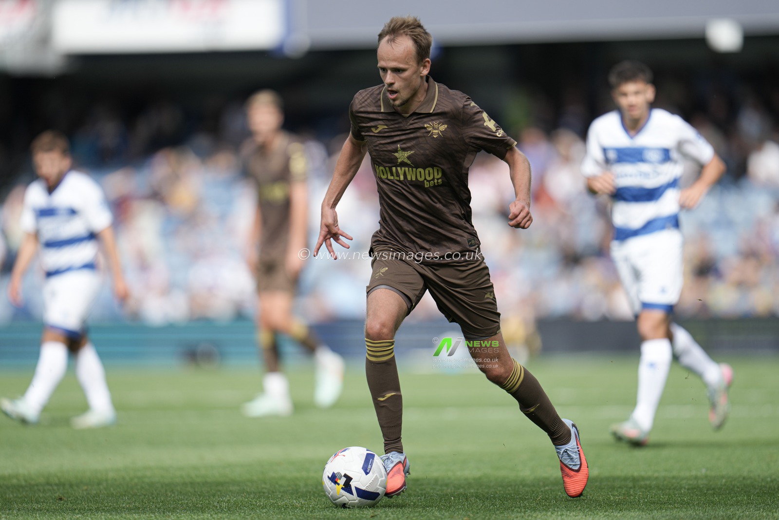 Mikkel Damsgaard of Brentford on the ball during the Pre-season friendly match Queens Park Rangers vs Brentford at Kiyan Prince Foundation Stadium, London, United Kingdom, 2nd August 2025

(Photo by Harvey Murphy/News Images)