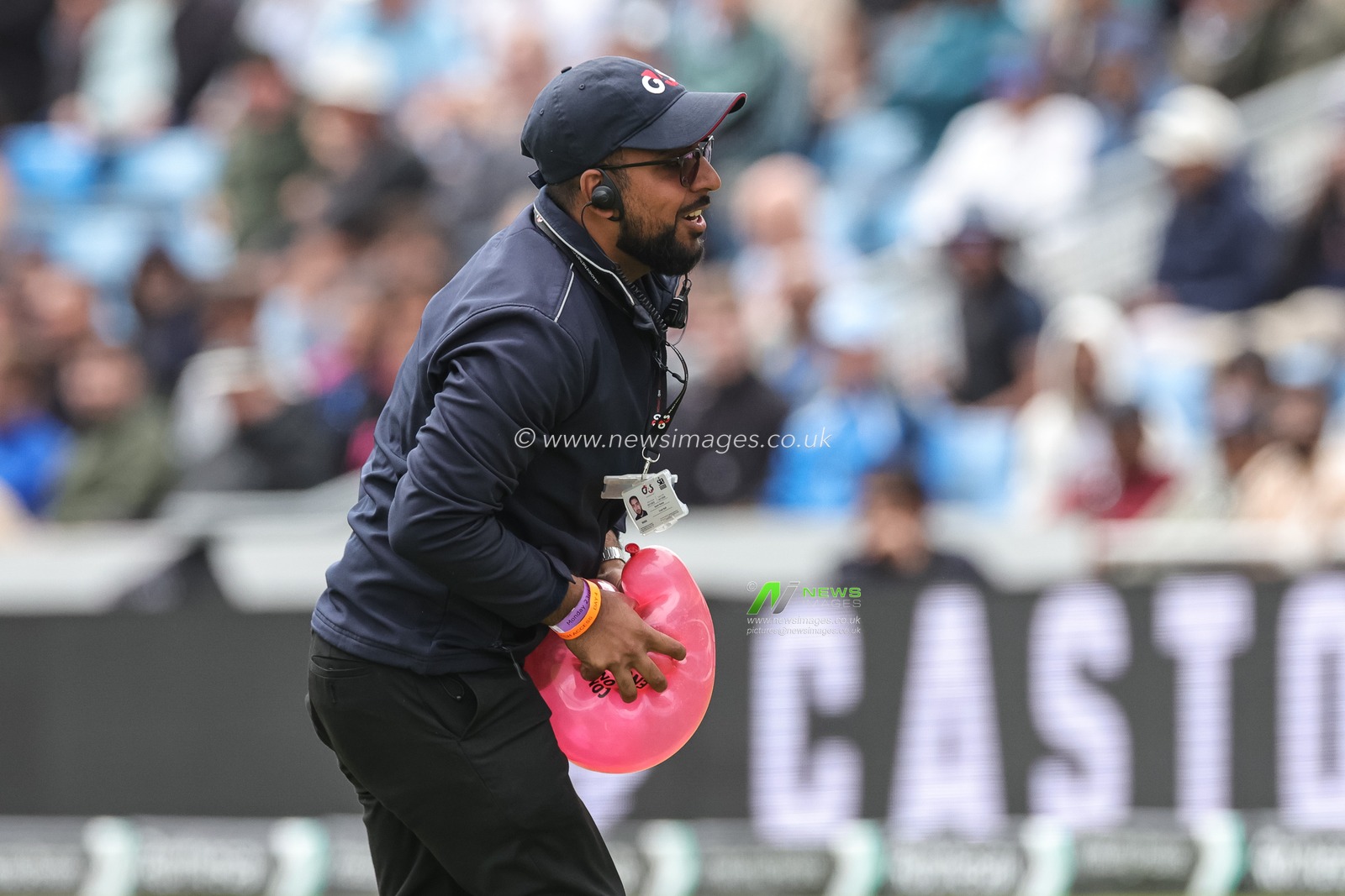A security personnel busts a balloon that enters the field of play during the 1st Rothesay Test Day 4 Match England v India at Headingley Cricket Ground, Leeds, United Kingdom, 23rd June 2025

(Photo by Mark Cosgrove/News Images)