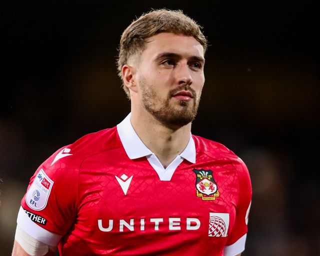 Sam Smith of Wrexham AFC lines up prior to the Sky Bet League 1 match Cambridge United vs Wrexham at Abbey Stadium, Cambridge, United Kingdom, 1st April 2025

(Photo by Izzy Poles/News Images)
