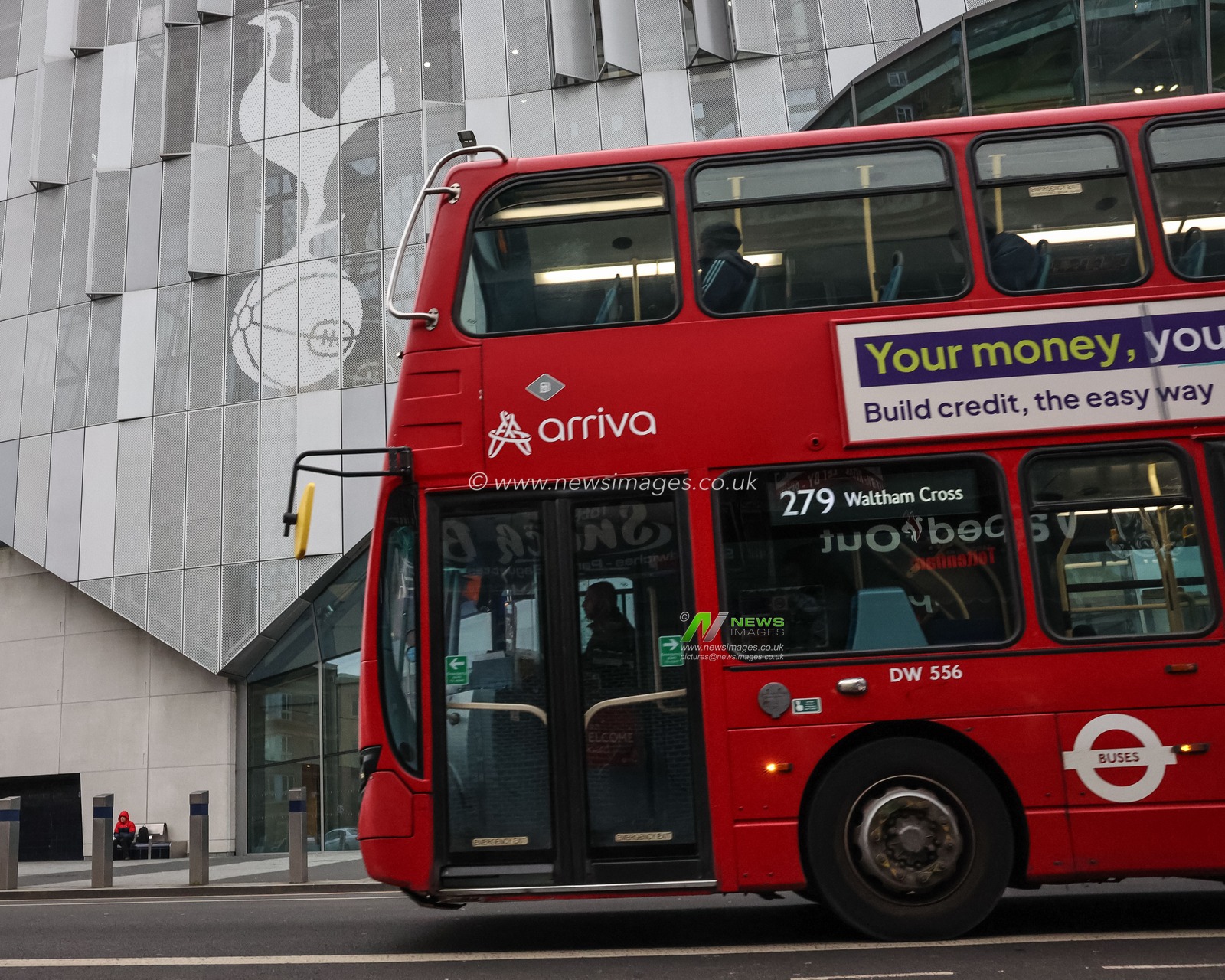 A red London bus passes The Tottenham Hotspur Stadium during the Carabao Cup Semi-Finals First Leg Tottenham Hotspur vs Liverpool at Tottenham Hotspur Stadium, London, United Kingdom, 8th January 2025

(Photo by Mark Cosgrove/News Images)