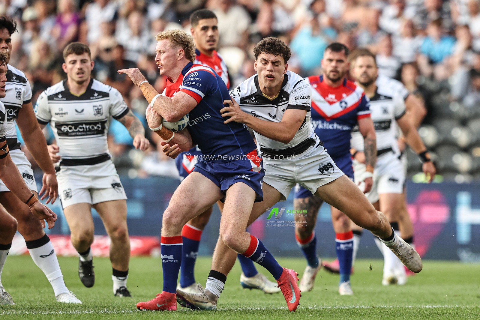 Lachlan Walmsley of Wakefield Trinity is tackled by Lewis Martin of Hull FC during the Betfred Super League round 18 match Hull FC vs Wakefield Trinity at MKM Stadium, Hull, United Kingdom, 10th July 2025

(Photo by Alfie Cosgrove/News Images)