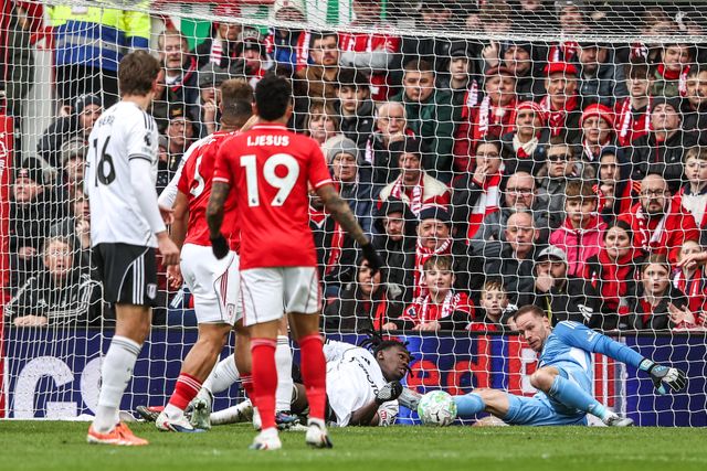 Ibrahim Sangare of Nottingham Forest saves a shot from Calvin Bassey of Fulham during the Premier League match Nottingham Forest vs Fulham at City Ground, Nottingham, United Kingdom on 15 March 2026

(Photo by Alfie Cosgrove/News Images)