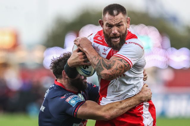 Jared Waerea-Hargreaves of Hull KR is tackled by Alex Walmsley of St. Helens during the Betfred Super League Semi Final 2 match Hull KR vs St Helens at Sewell Group Craven Park, Kingston upon Hull, United Kingdom, 3rd October 2025

(Photo by Alfie Cosgrove/News Images)