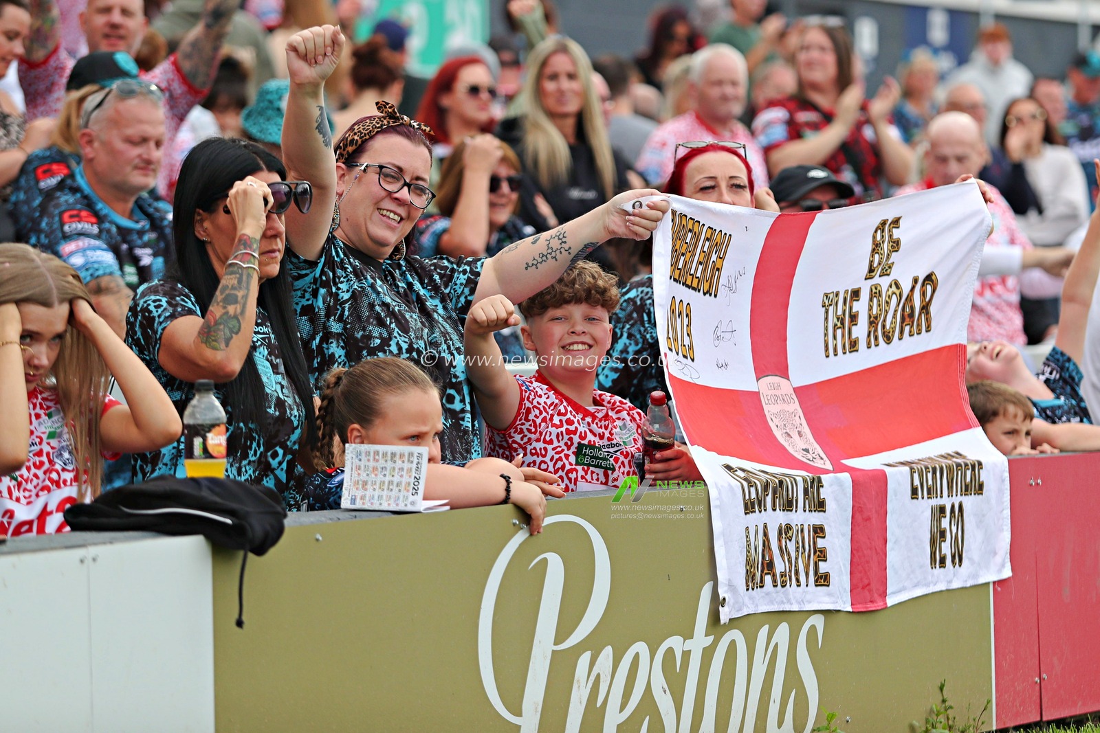 Leigh fans celebrate after the Betfred Super League Round 14 match Wakefield Trinity vs Leigh Leopards at DIY Kitchens Stadium, Wakefield, United Kingdom, 15th June 2025(Photo by Sam Eaden/News Images)