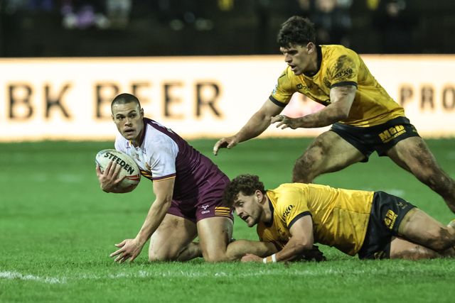 Tui Lolohea of Huddersfield Giants is tackled by George Lawler of Castleford Tigers during the Betfred Super League Round 3 match Castleford Tigers vs Huddersfield Giants at OneBore Stadium, Castleford, Untied Kingdom on 27 February 2026

(Photo by Mark Cosgrove/News Images)