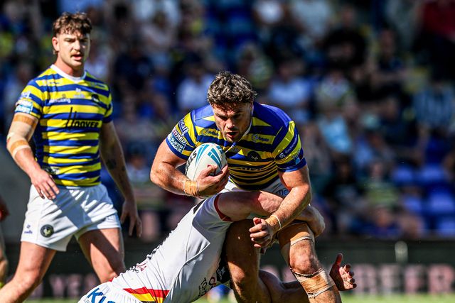 Joe Philbin of Warrington Wolves is tackled during the Betfred Super League round 12 match Warrington Wolves vs Bradford Bulls at The Halliwell Jones Stadium, Warrington, United Kingdom on 24 May 2026

(Photo by Alfie Cosgrove/News Images)