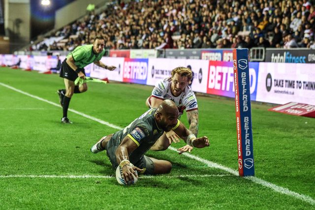 Maika Sivo of Leeds Rhinos goes over for a try during the Betfred Super League round 11 match Wigan Warriors vs Leeds Rhinos at The Brick Community Stadium, Wigan, United Kingdom on 15 May 2026

(Photo by Alfie Cosgrove/News Images)