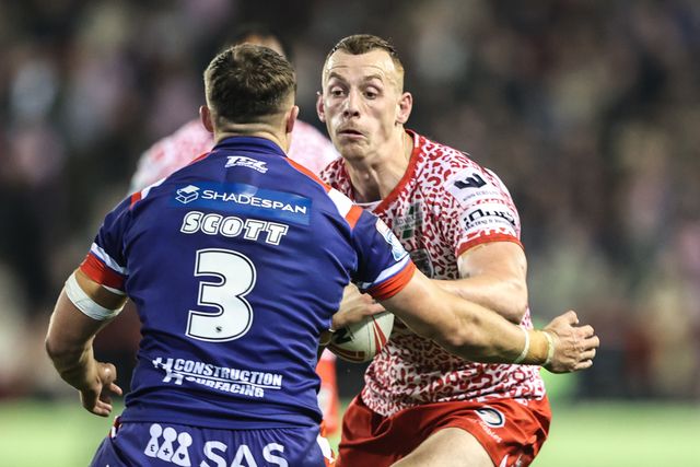 Frankie Halton of Leigh Leopards is tackled by Cam Scott of Wakefield Trinity during the Betfred Super League play-off Eliminator 1 match Leigh Leopards vs Wakefield Trinity at Progress With Unity Stadium, Leigh, United Kingdom, 26th September 2025

(Photo by Alfie Cosgrove/News Images)