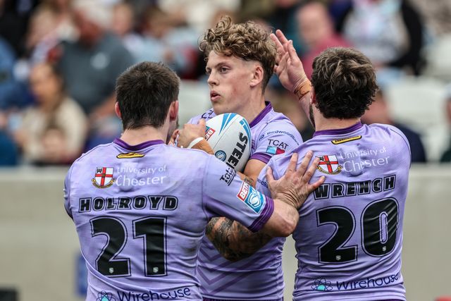 Arron Lindop of Warrington Wolves celebrates his try during the Betfred Super League Round 11 match Wakefield Trinity vs Warrington Wolves at DIY Kitchens Stadium, Wakefield, United Kingdom, 18th May 2025

(Photo by Alfie Cosgrove/News Images)