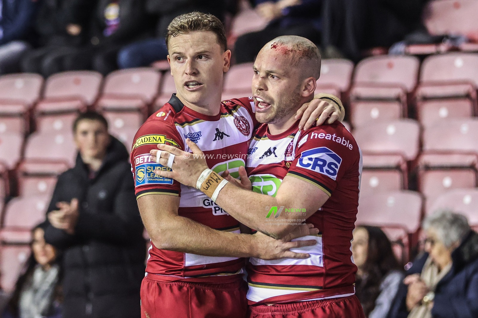 Liam Marshall of Wigan Warriors celebrates his try to make it 22-0 during the Betfred Super League Round 26 match Wigan Warriors vs Castleford Tigers at The Brick Community Stadium, Wigan, United Kingdom, 12th September 2025

(Photo by Alfie Cosgrove/News Images)