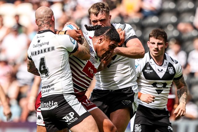 Patrick Mago of Wigan Warriors is tackled by Zak Hardaker of Hull FC during the Betfred Super League round 16 match Hull FC vs Wigan Warriors at MKM Stadium, Hull, United Kingdom on 27 June 2026

(Photo by Alfie Cosgrove/News Images)