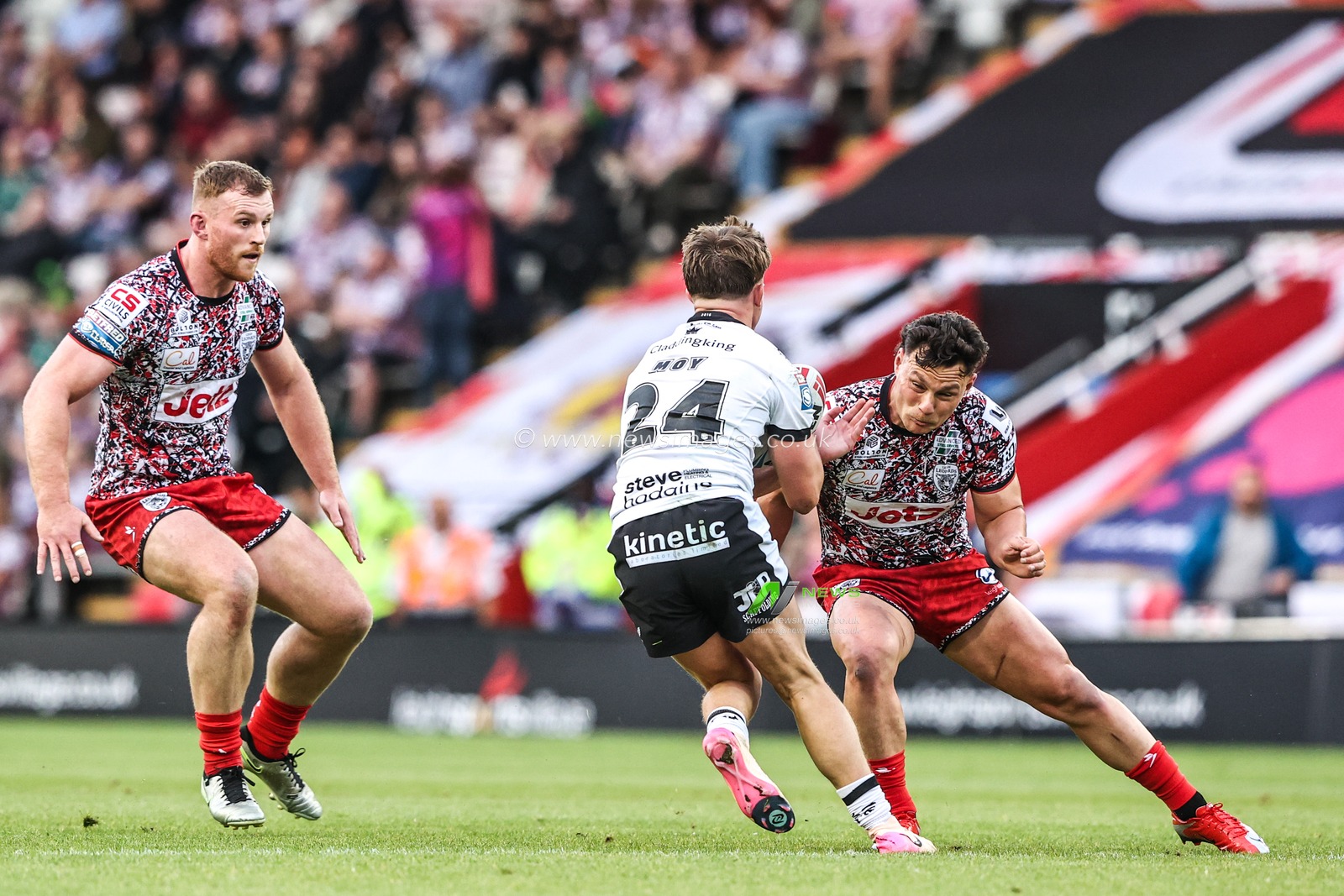 Logan Moy of Hull FC is tackled by Lachlan Lam of Leigh Leopards during the Betfred Super League round 12 match Leigh Leopards vs Hull FC at Leigh Sports Village, Leigh, United Kingdom on 22 May 2026

(Photo by Alfie Cosgrove/News Images)
