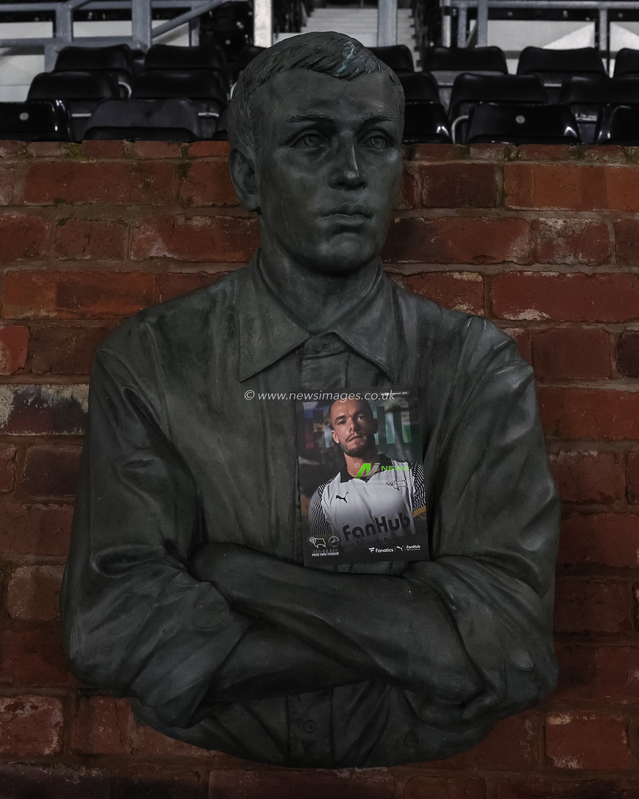 The Steve Bloomer statue and todays official match day progress, with Joe Ward of Derby County on there front cover during the Sky Bet Championship match Derby County vs Millwall at Pride Park Stadium, Derby, United Kingdom, 10th December 2025

(Photo by Mark Cosgrove/News Images)

*** GER AUT SUI OUT ***