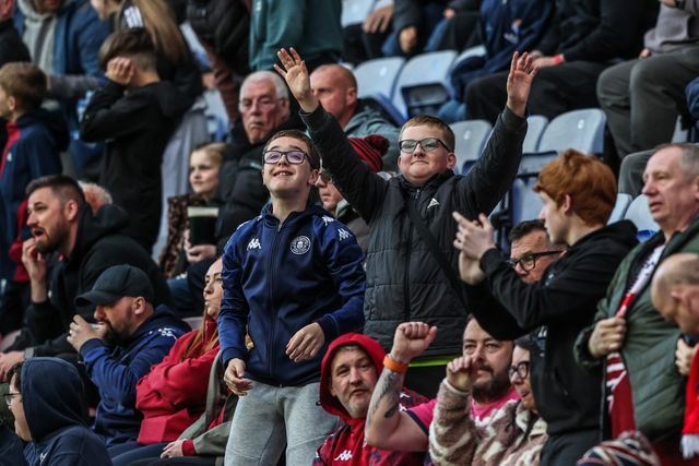 Wigan fans celebrate a try during the Betfred Super League round 11 match Wigan Warriors vs Leeds Rhinos at The Brick Community Stadium, Wigan, United Kingdom on 15 May 2026

(Photo by Alfie Cosgrove/News Images)
