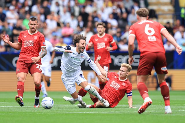 Josh Sheehan of Bolton Wanderers is tackles by Daniel Jebbison of Preston North End during the Sky Bet Championship match Bolton Wanderers vs Preston North End at Toughsheet Community Stadium, Bolton, United Kingdom on 15 August 2026

(Photo by Jorge Horsted/News Images)