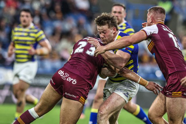 Luke Thomas of Warrington Wolves is tackled by Chris Patolo of Huddersfield Giants during the Betfred Super League round 10 match Huddersfield Giants vs Warrington Wolves at Accu Stadium, Huddersfield, United Kingdom on 02 May 2026

(Photo by Alfie Cosgrove/News Images)