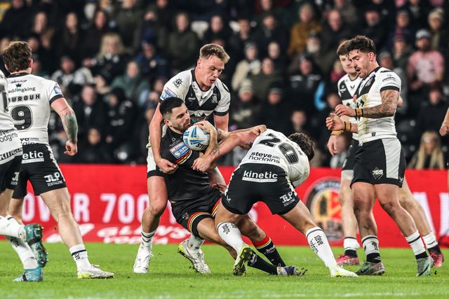 Caleb Aekins of Bradford Bulls is tackled by Yusuf Aydin of Hull FC during the Betfred Super League round 1 match Hull FC vs Bradford Bulls at MKM Stadium, Hull, United Kingdom on 14 February 2026

(Photo by Alfie Cosgrove/News Images)