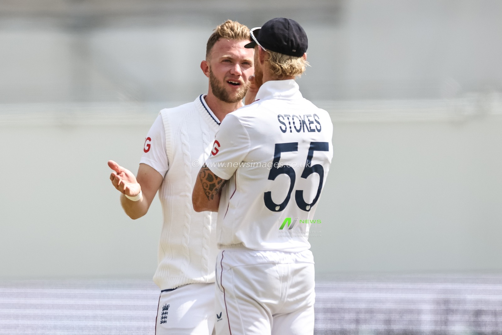 Sam Cook of England speaks to England captain Ben Stokes during the Rothesay Test Match Day 2 England vs Zimbabwe at Trent Bridge, Nottingham, United Kingdom, 23rd May 2025

(Photo by Mark Cosgrove/News Images)