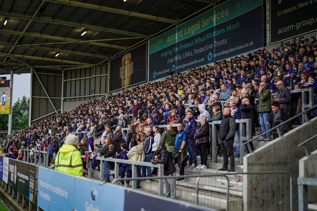 Wolves fans look on during the Betfred Super League round 14 match St Helens vs Warrington Wolves at The BrewDog Stadium, St Helens, United Kingdom on 11 June 2026

(Photo by Maynard Manyowa/News Images)