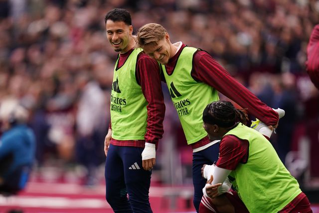 Gabriel Martinelli of Arsenal, Martin Ødegaard of Arsenal and Noni Madueke of Arsenal warming up during the Premier League match West Ham United vs Arsenal at London Stadium, London, United Kingdom on 10 May 2026

(Photo by Harvey Murphy/News Images)