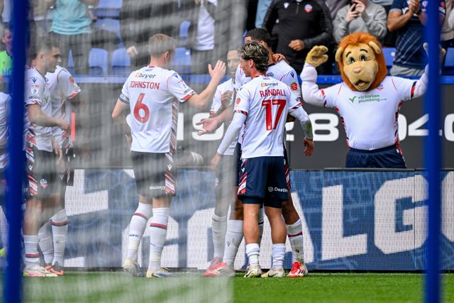 Mason Burstow of Bolton Wanderers  is congratulated by team mates after scoring during the Sky Bet League 1 match Bolton Wanderers vs AFC Wimbledon at Toughsheet Community Stadium, Bolton, United Kingdom, 6th September 2025

(Photo by Adam Gee/News Images)