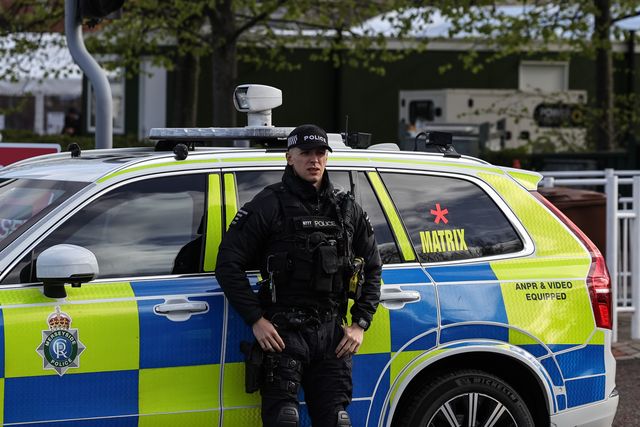 Armed police outside the main entrance during the 2026 Randox Grand National Day at Aintree Racecourse, Aintree, United Kingdom on 11 April 2026

(Photo by Mark Cosgrove/News Images)