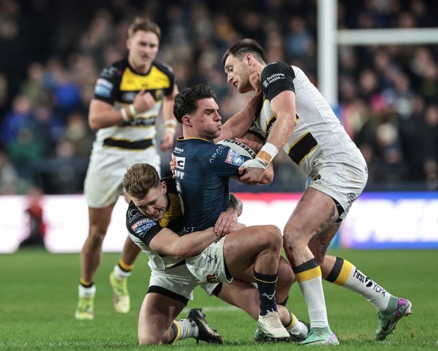 Brodie Croft of Leeds Rhinos is tackled by Sam Wood and Liam Harris of York Knights during the Betfred Super League Round 2 match Leeds Rhinos vs York Knights at AMT Headingley Stadium, Leeds, United Kingdom on 20 February 2026

(Photo by Mark Cosgrove/News Images)