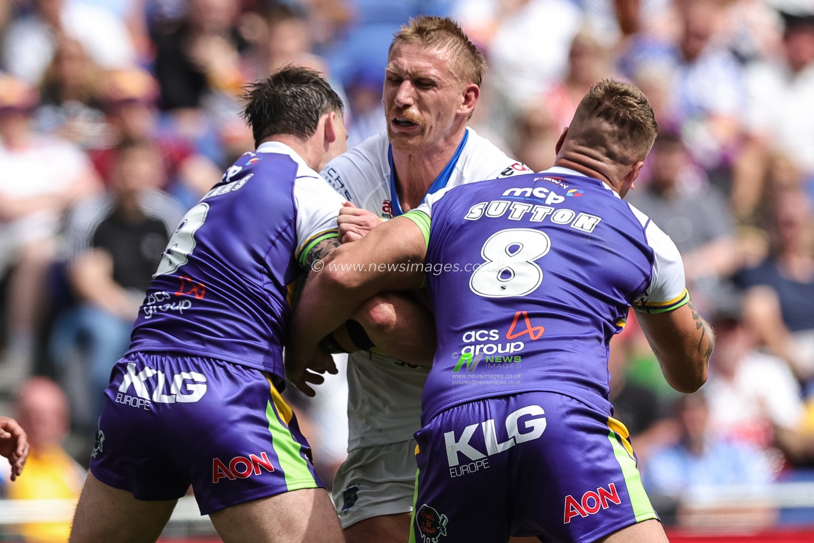 Mikolaj Oledzki of Leeds Rhinos 
is tackled by Andy Ackers of Bradford Bulls and Ryan Sutton of Bradford Bulls during the Betfred Super League Magic Weekend match Leeds Rhinos vs Bradford Bulls at Hill Dickinson Stadium, Liverpool, United Kingdom on 05 July 2026

(Photo by Mark Cosgrove/News Images)