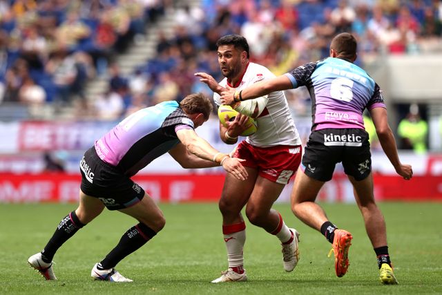 Rhyse Martin of Hull KR is tackled by Joe Batchelor of Hull FC and Jake Arthur of Hull FC during the Betfred Super League Magic Weekend match Hull KR vs Hull FC at Hill Dickinson Stadium, Liverpool, United Kingdom on 04 July 2026

(Photo by Alfie Cosgrove/News Images)