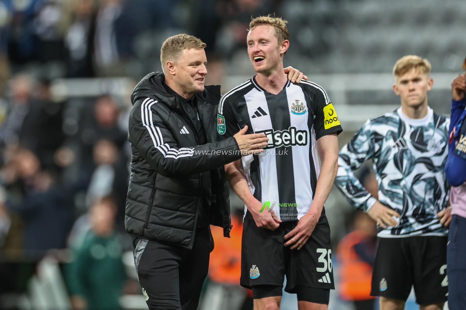 Eddie Howe manager of Newcastle United celebrates the 2-0 win with Sean Longstaff of Newcastle United during the Carabao Cup Last 16 match Newcastle United vs Chelsea at St. James's Park, Newcastle, United Kingdom, 30th October 2024

(Photo by Mark Cosgrove/News Images)