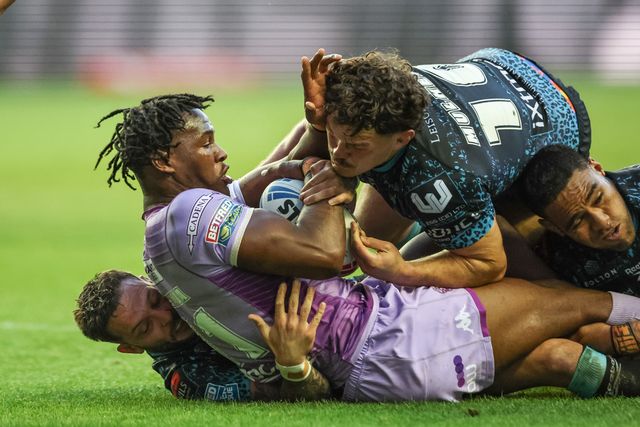 Junior Nsemba of Wigan Warriors is tackled by Robbie Mulhern of Leigh Leopards during the Betfred Super League Round 11 match Wigan Warriors vs Leigh Leopards at The Brick Community Stadium, Wigan, United Kingdom, 16th May 2025

(Photo by Mark Cosgrove/News Images)