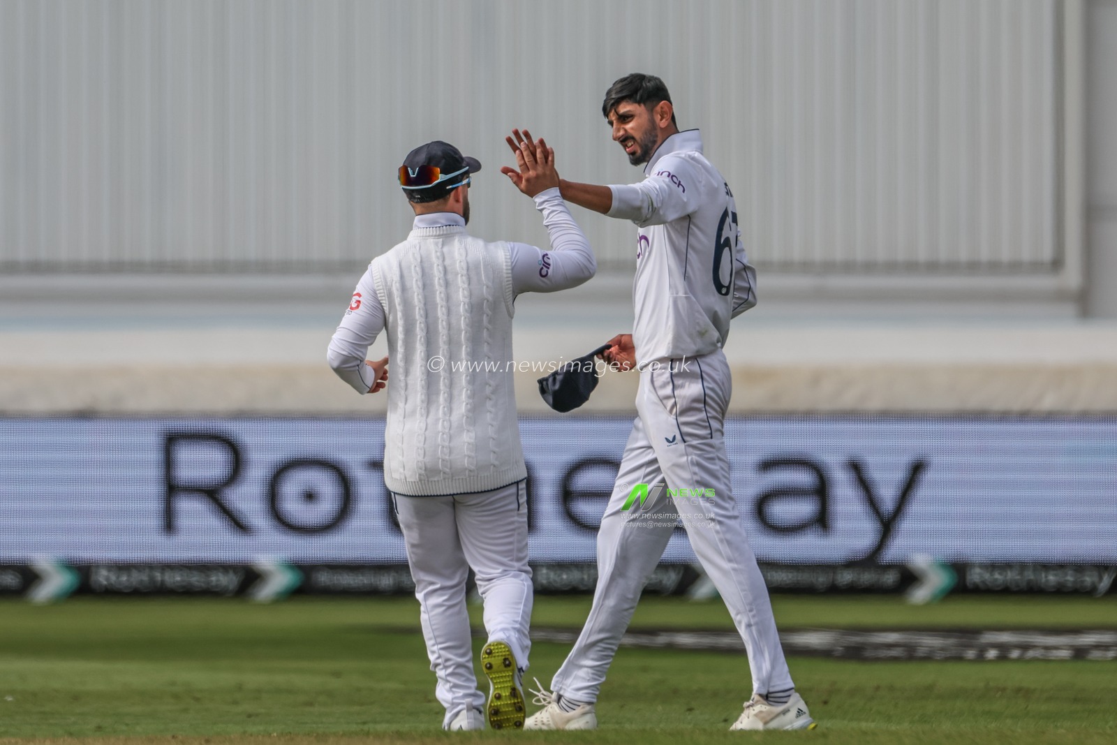 Shoaib Bashir of England celebrates the wicket maiden with Ben Duckett of England during the Rothesay Test Match day four match England vs West Indies at Trent Bridge, Nottingham, United Kingdom, 21st July 2024

(Photo by Mark Cosgrove/News Images)