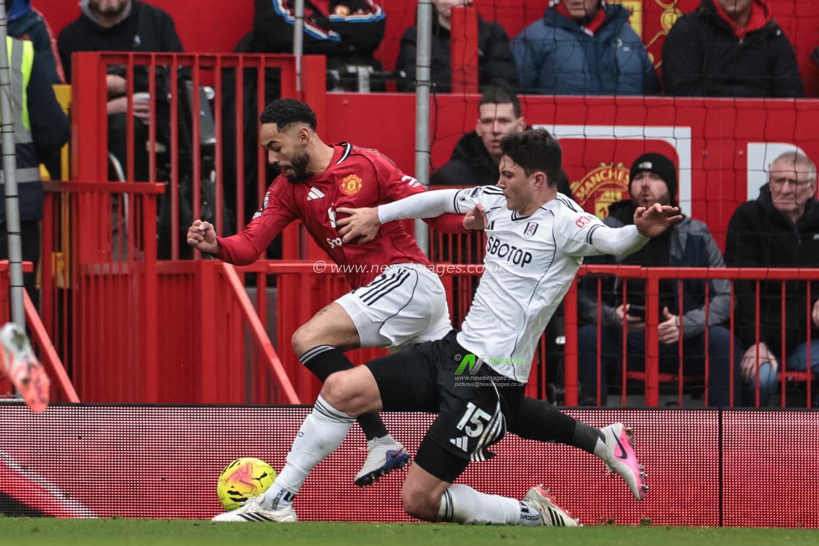 Jorge Cuenca of Fulham fouls Matheus Cunha of Manchester United in the penalty area referee John Brooks gives a penalty but Video assistent referee James Bell rules the foul outside the area, no penalty during the Premier League match Manchester United vs Fulham at Old Trafford, Manchester, United Kingdom, 1st February 2026

(Photo by Mark Cosgrove/News Images)
