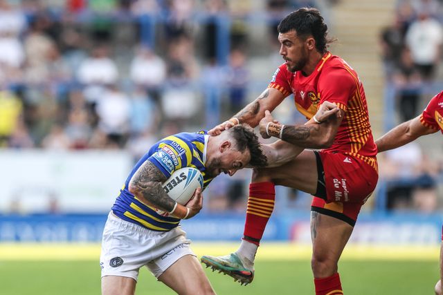 Matty Ashton of Warrington Wolves is tackled by Charlie Staines of Catalans Dragons during the Betfred Super League round 16 match Warrington Wolves vs Catalans Dragons at The Halliwell Jones Stadium, Warrington, United Kingdom on 25 June 2026

(Photo by Alfie Cosgrove/News Images)