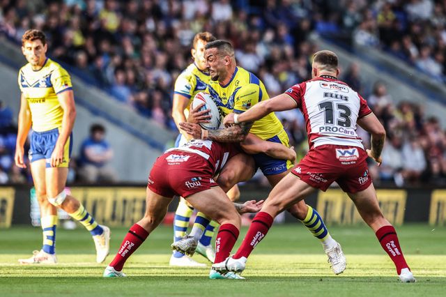 Paul Vaughan of Warrington Wolves is tackled during the Betfred Super League round 21 match Warrington Wolves vs Wigan Warriors at Halliwell Jones Stadium, Warrington, United Kingdom, 8th August 2025

(Photo by Alfie Cosgrove/News Images)
