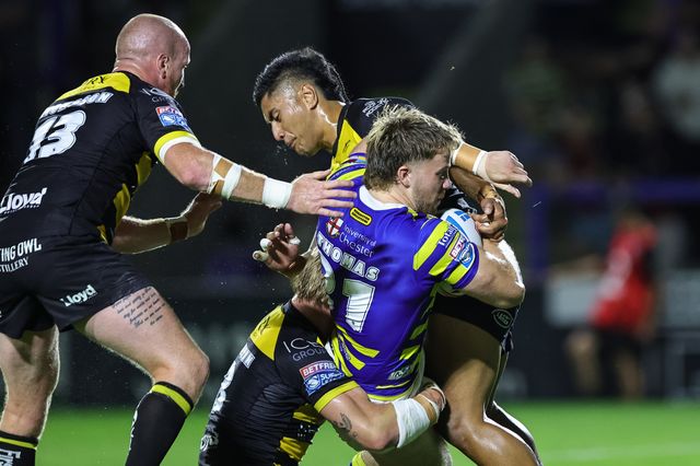 Luke Thomas of Warrington Wolves is tackled by Matty Foster of York Knights during the Betfred Super League round 23 match Warrington Wolves vs York Knights at The Halliwell Jones Stadium, Warrington, United Kingdom on 13 August 2026

(Photo by Mark Cosgrove/News Images)