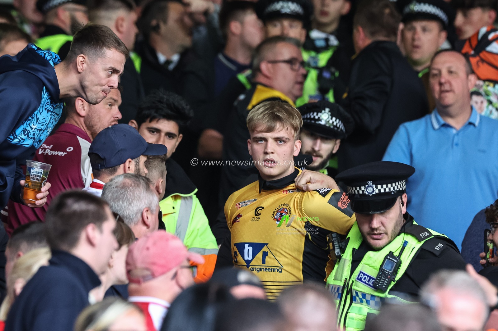 Police make an arrest after a altercation in the stand during the Magic Weekend match Catalans Dragons vs Hull KR at Elland Road, Leeds, United Kingdom, 18th August 2024

